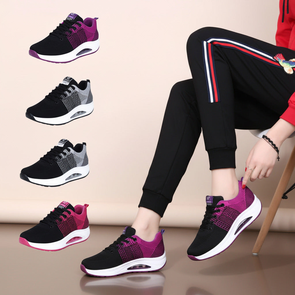 Person wearing black and purple athletic shoes with additional pairs displayed on a beige background