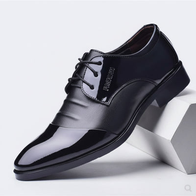 Black dress shoe on a white background