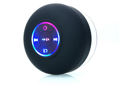 TS Store black waterproof Bluetooth speaker with suction cup, illuminated control buttons for play, pause, skip, and power.