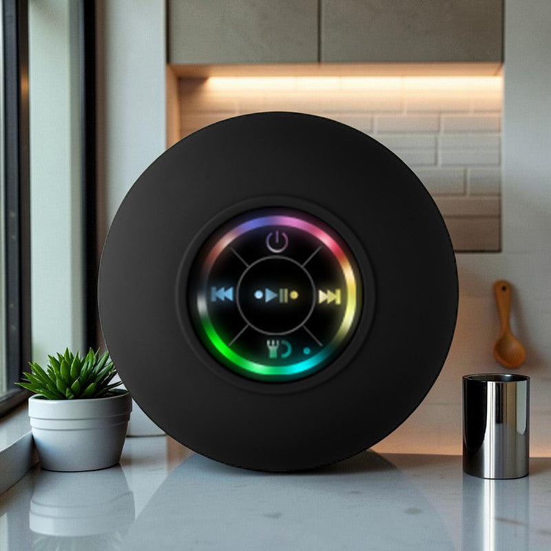 TS Store black waterproof Bluetooth speaker with suction cup and colorful LED lights, featuring playback controls and power button.