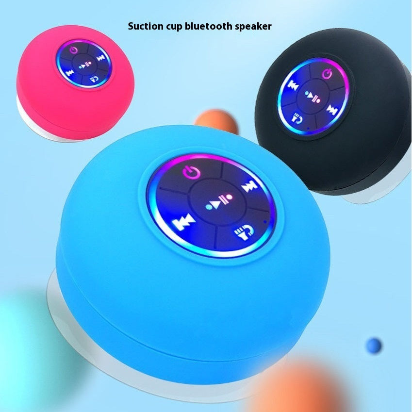 TS Store blue waterproof suction cup Bluetooth speaker with illuminated controls, ideal for car, home, or outdoor use.