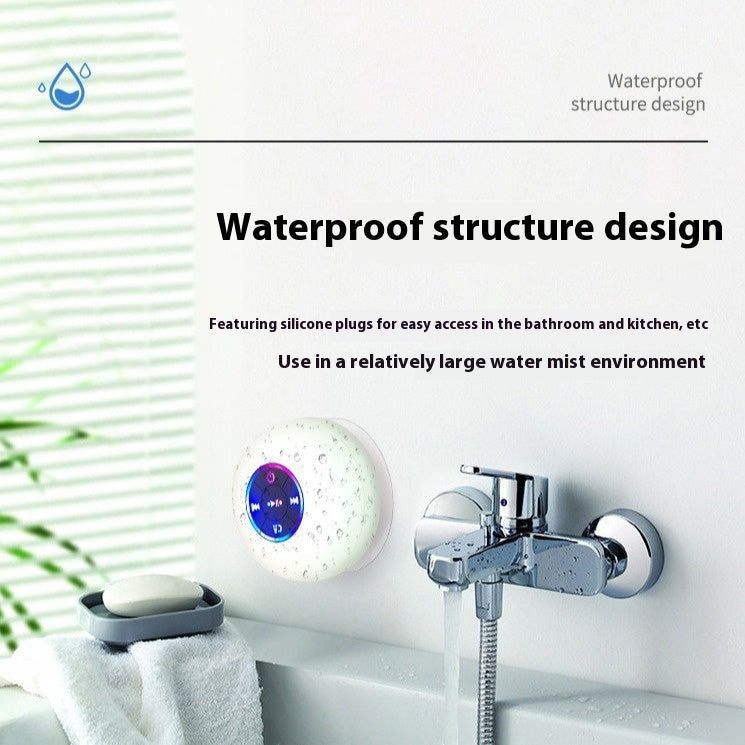 TS Store white waterproof Bluetooth speaker with suction cup, ideal for bathrooms and kitchens.
